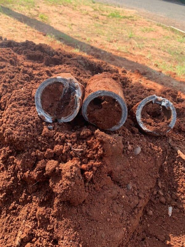 Pieces of the asbestos pipe that were removed.  