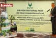 A cake. A plaque that marks the 100-year anniversary. Minister Willie Aucamp. > Photo: Supplied/SANParks