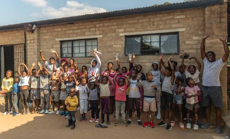 Some of the children who received shoes on Nelson Mandela day. >Photo: Supplied/Phil Olckers