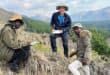 Christoph Chiburre, Armin Waldmann and Mfundo Mkhatshea collect data preserved in the sandstone of the Makhonjwa Mountains. > Photo: Supplied/Christoph Heubeck