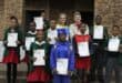 Learners and judges stand proudly with their certificates. > Photos: Zané Botes