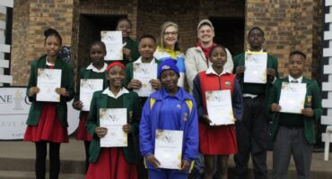 Learners and judges stand proudly with their certificates. > Photos: Zané Botes