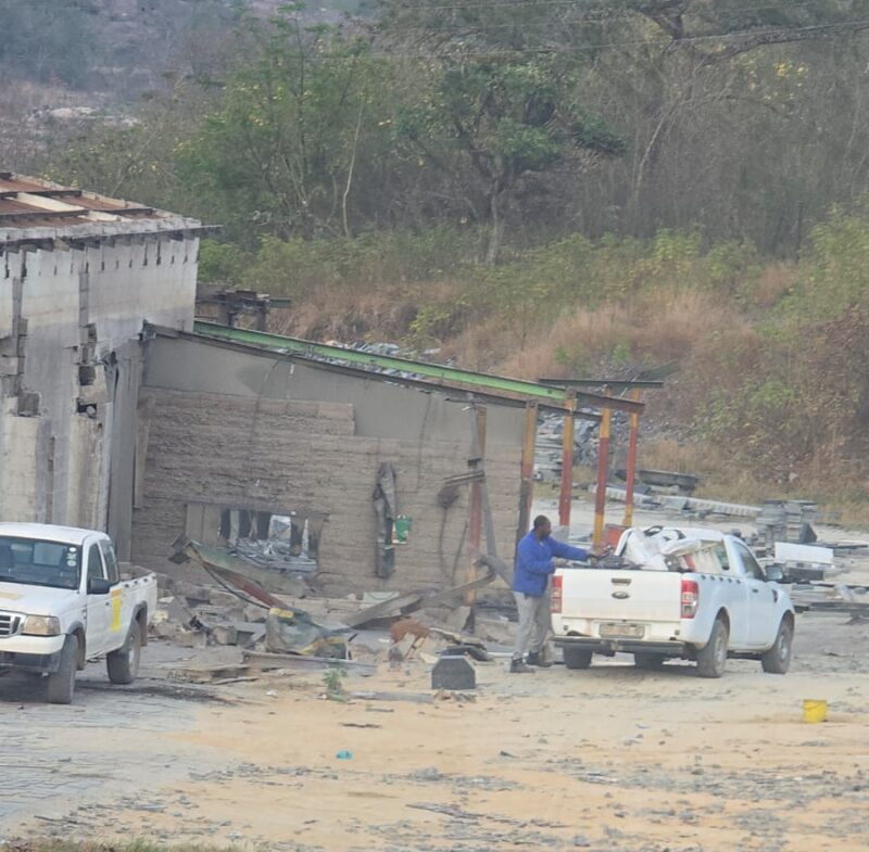Alleged looters photographed at Lowveld Tombstones.
