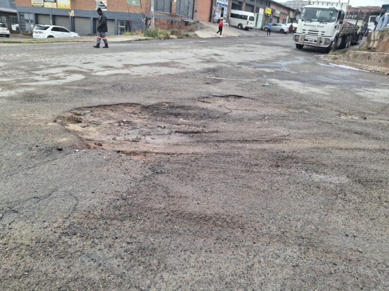 One of the potholes that was filled with soil
