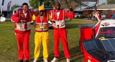 Sphamandla Ndlovu, Mangalies Gxesha of SolarFlair and Lucky Nhlanhla Twala. > Photo: Supplied/Guy Bagnall