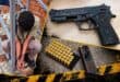 The alleged gunman, and the recovered weapon and ammunition. > Photo: Supplied/ACS Spartan Security