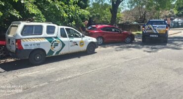Security company vehicles corner the suspected stolen vehicle. Photo: Supplied