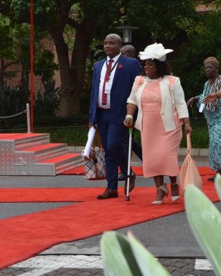 MEC Violet Siwela and a partner.