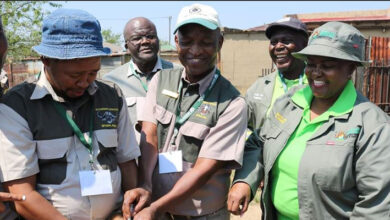 MEC Busi Shiba with vet services staff during a rabies vaccination campaign in Daggakraal last year.