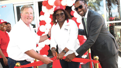 Puma Energy’s network development manager, Johan du Toit, the owner, Martha Makhubedu, and General manager of Puma Energy SA, Tumelo Ramalebana