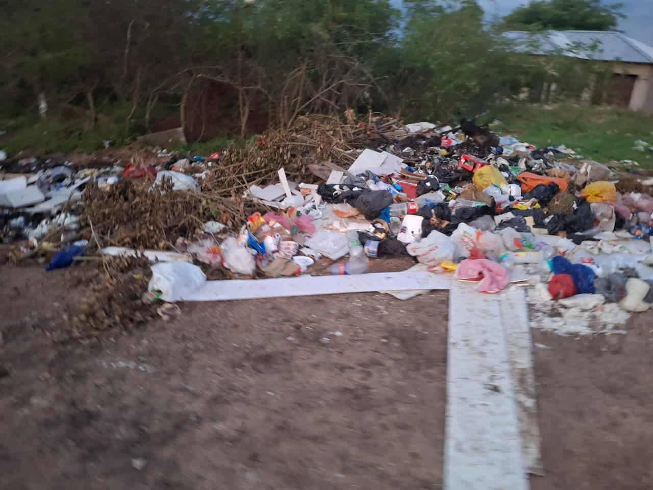 One of the illegal dumping sites near Nkambeni River.