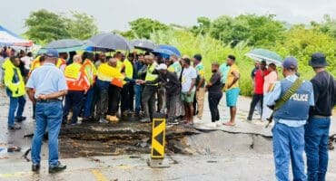 The MEC and the CoM entourage during their visit at the damaged bridge between Karino and KaNyamazane. > Photo: Supplied/CoM