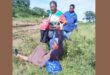 Teacher Goodness Shabangu fell on the muddy ground and her colleague Nomvula Mculu picked her up while another colleague Alucia Chiloane looked on. >Photo: Supplied/Nomvula Mculu