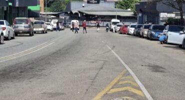 Some of the vehicles that are being washed and repaired on Anderson Street. > Photo: Tumelo Waga Dibakwane