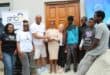 Sfiso Bennett hands over the house key to the Mabuza family. > Photo:Tumelo Waga Dibakwane