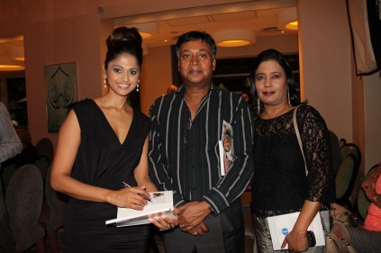 Co-author Kanchana Moodliar signs a book for Siva and Vani Govender at the Launch of You Can be Sugar Free - Indians vs Diabetes.