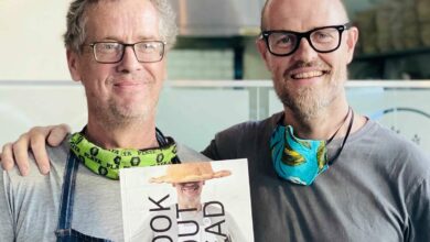 Adam-&_Roger_with-book-s