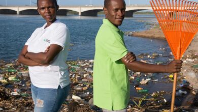 Green Corridors Susan Dlamini and Siphiwe Rakgabale at the mouth of the Umgeni at Blue Lagoon_- and the waste that comes down Durban's waterways DSC3763a