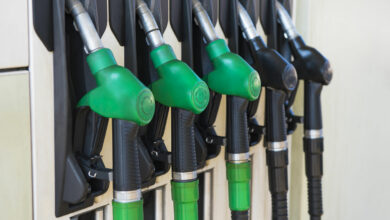 Different gas diesel pistols, at gas station.