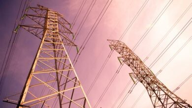 Massive power lines stretch into the distance