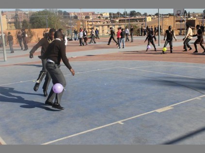 Minerva Secondary School students engage in a balloon game during the Grade 10 sports day at Three Square Sports Complex.