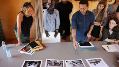 Some of the experts review the portfolios