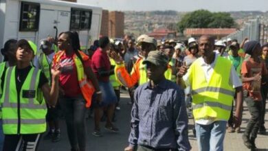 Disgruntled members of the community march
