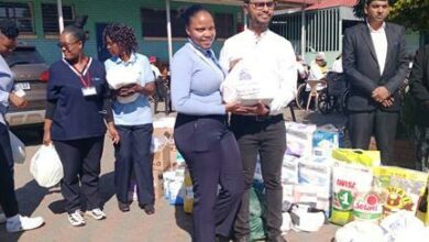 Another of the staff members of the hospice also receives a token of appreciation