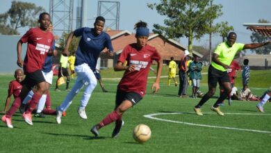 A Diepkloof Ladies' player (in maroon and black) turns to pace away with the ball to the goals with a Croesus Ladies defender hot on her heels and a teammate in support. Photo: Maria Athanassouli