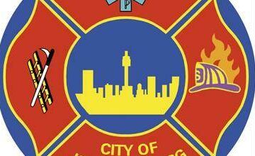 The logo of the City's Emergency Management Services whose firefighters responded to the house fire.