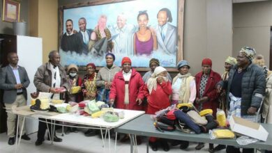 The staff of the Thabo Mbeki Foundation and Alex philanthropist Linda Twala and Phuthaditjaba gogos welcome birthday presents from uMkhwenyana wase Alexandra. Photo: Gezani Mabasa