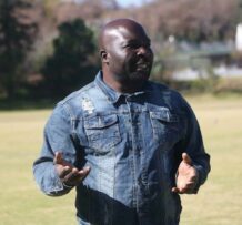 Opopo Football Club Academy founder-turned-team manager Ferdinard Ndi speaks at the kit handover. Photo: Sipho Siso