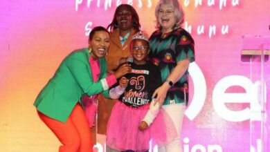 Elana Afrika-Bredenkamp, Sylvia Mchunu and Kim Robertson Smith enjoy a joke with Princess Mchunu (front) at the race launch. Photo: Nicholas Zaal
