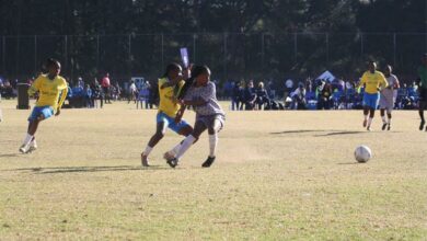 A tussle for the ball between a Mamelodi Sundowns Ladies player (yellow) and her Bluebirds Ladies counterpart during the Engen tournament. Photo: Sipho Siso
