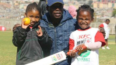 Tshepang Khanya and Obotlhale Mothabi receive hugs from their coach Thapelo Moche after the day's bowling and batting sessions. Photo: Sipho Siso