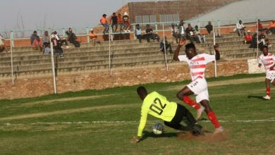 Polokwane Rovers' keeper tries to collect the ball from the feet of the tall Amajananda striker Gabriel 'Beast' Madu. Photo: Sipho Siso