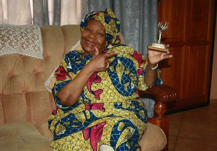 Rosina Duduzile Moropa shows off her Woman of Worth trophy she was awarded by the late Pick n Pay tycoon Raymond Ackerman. Photo: Sipho Siso