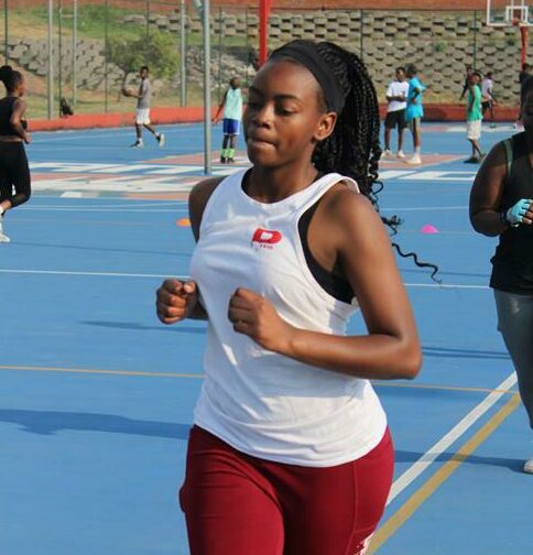 Mukundi Ntshisaulu jogs around the pitch to get her body warm. Photo: Comfort Makhanya