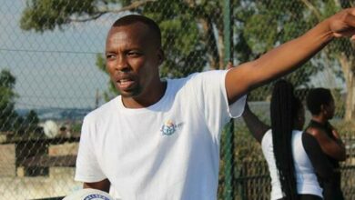 Coach Carly Nkomo gives the girls instructions during training.