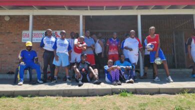 Some of the pastors and younger players involved in the games pose for a photograph.