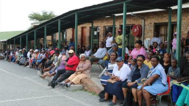 Residents at the meeting listen to an address by their councillor Tefo Raphadu on the reasons for the delay in issuing title deeds for Tsutsumani. Photo: Xoliswa Zakwe