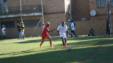 Loyo Stars defender Lucas Moeng (red) keeps menacing United Stars' Kabelo Rakosa under check. Photo: Sipho Siso