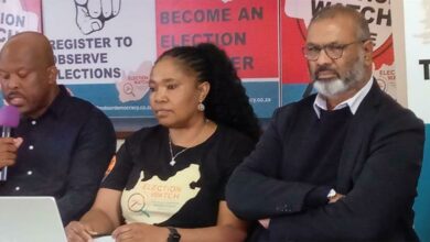 DOD communications manager Andries Sibanyoni reads a statement regarding the coming elections. DOD campaigns manager Nomasonto Magwaza and Legal Resources Centre national director Nersan Govender listen attentively. Photo: Sipho Siso