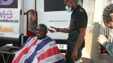 Mobile barber Paballo Busa ensures Albert Maphosa is clean-shaven when Mobile Barbers visited the Andries Meyer Old Age Home. Photo: Sipho Siso