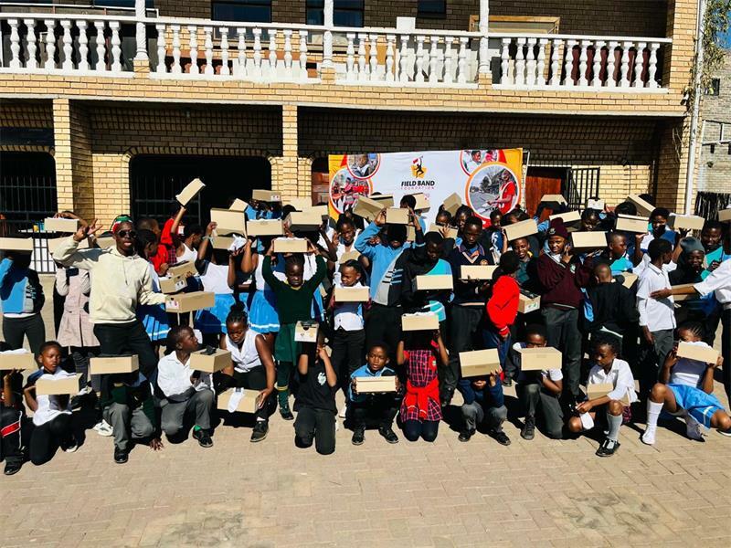 Children with their school shoes.