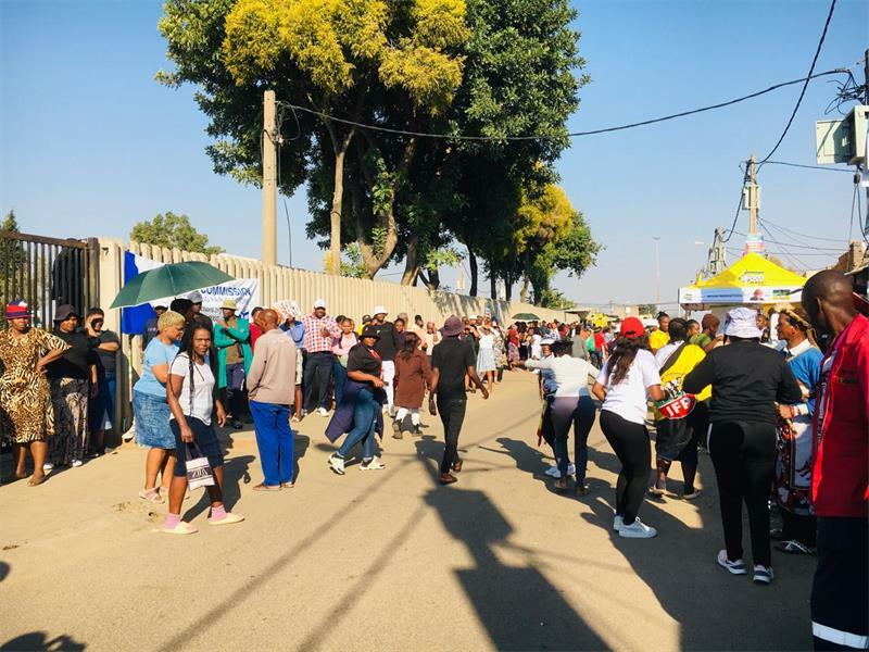 Residents at the 3rd Avenue Library voting station dance and sing to show their excitement for the 2024 elections. Photo: Xoliswa Zakwe