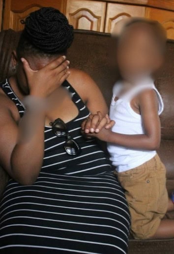 Sibongile Ncedani and her son Nathan, emotional from reliving the ordeal her mother has recently survived. Portia Ncedani did not feel up to being photographed, fearful of victimisation.