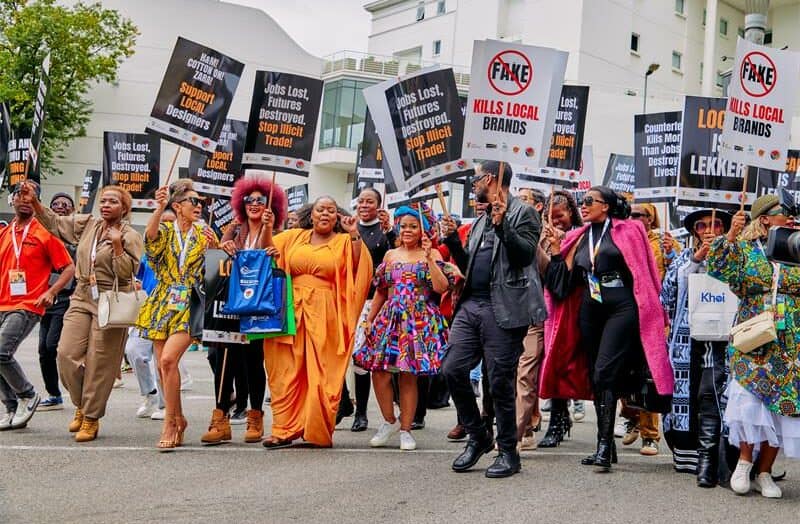 South African fashion icons unite in a powerful march, urging consumers to support locally made goods and combat illicit trade.