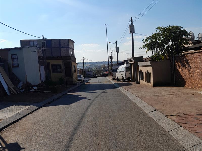 Residents of 21st Avenue in Alexandra are terrified as gunfire frequently pierces their roofs, forcing them to live in constant fear.