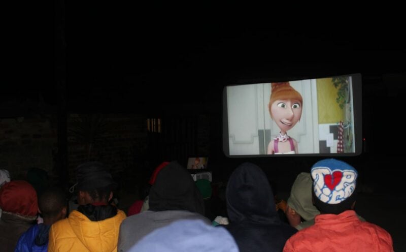 The Eye Pictures 1920 and the Stepping Tennis Foundation transformed a street in Alexandra into a makeshift cinema, turning what would have been an ordinary Friday night into an unforgettable night of unity and laughter.